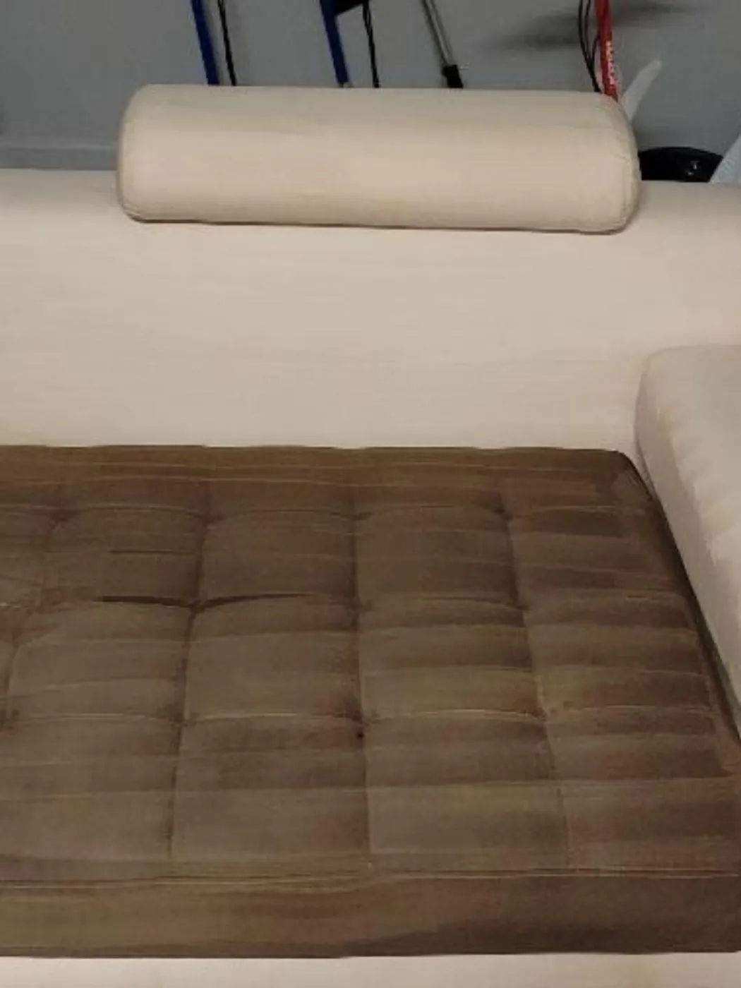 Before and after upholstery cleaning on a sofa cushion in Rockville, MD